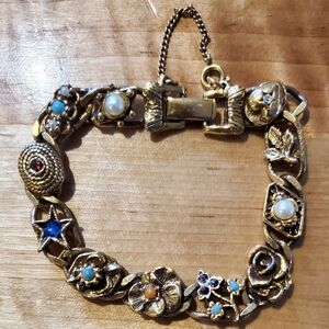 VINTAGE GOLDETTE NY GOLD TONE 11 SLIDE CHARM BRACELET